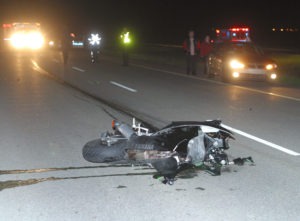 motorcycle wreck at night