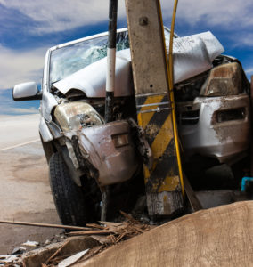 truck wrapped around a pole